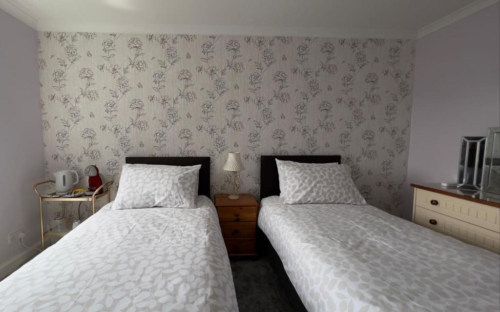 Letto o letti in una camera di Dunrigh Guest House