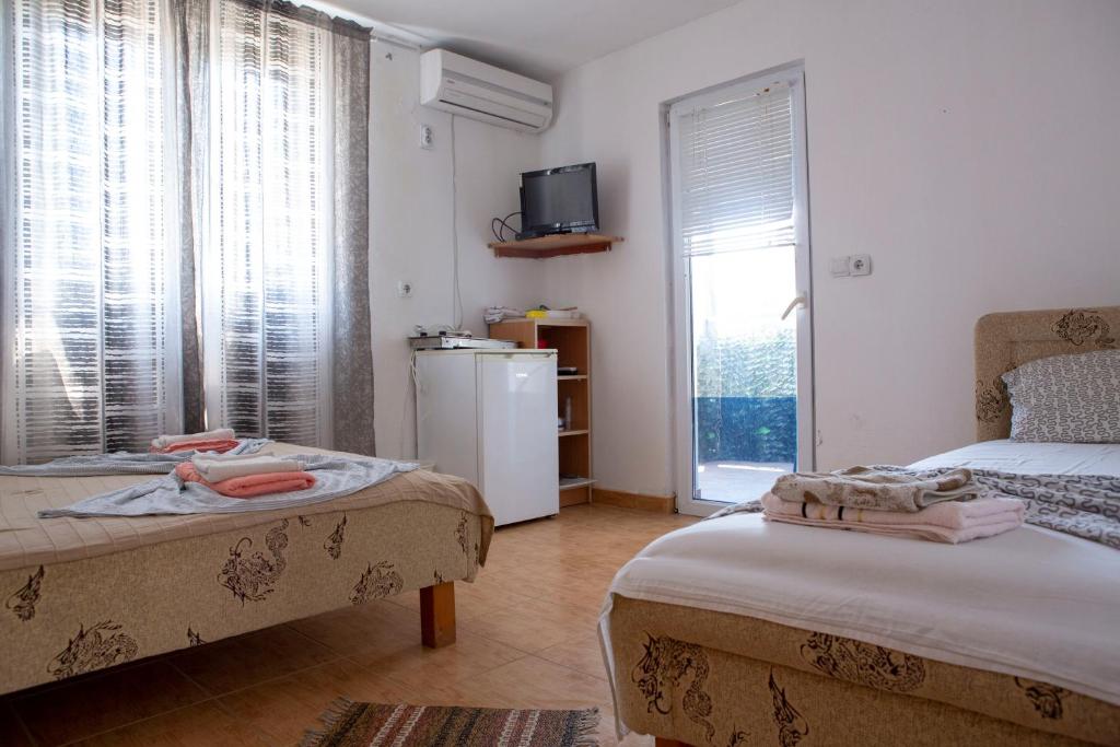 Postel nebo postele na pokoji v ubytování Villa Horizon Canj