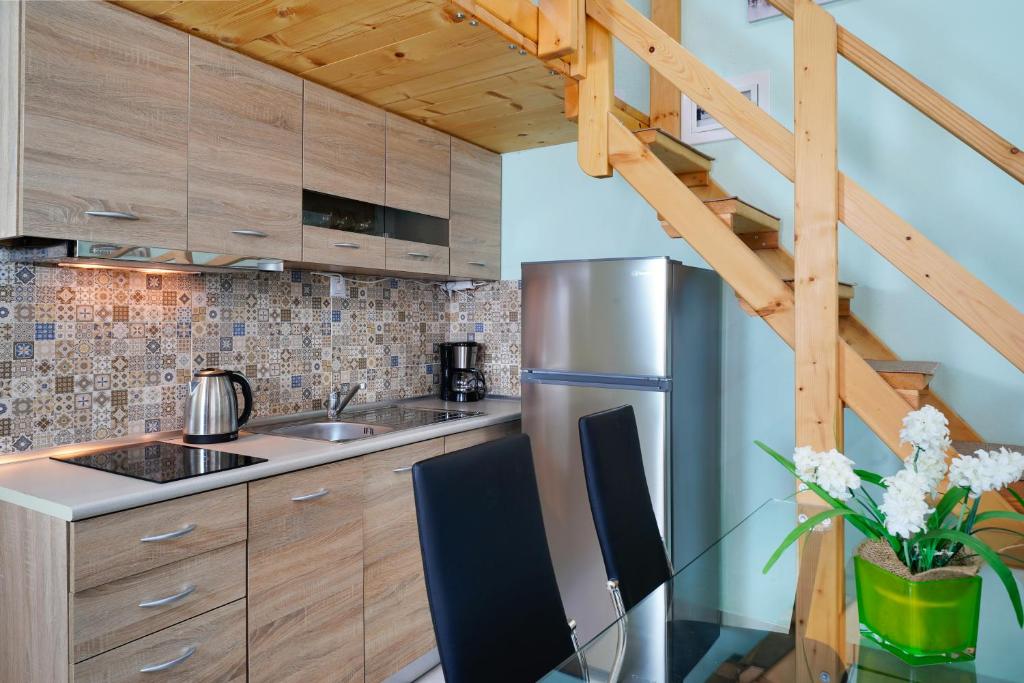A kitchen or kitchenette at Georgios House