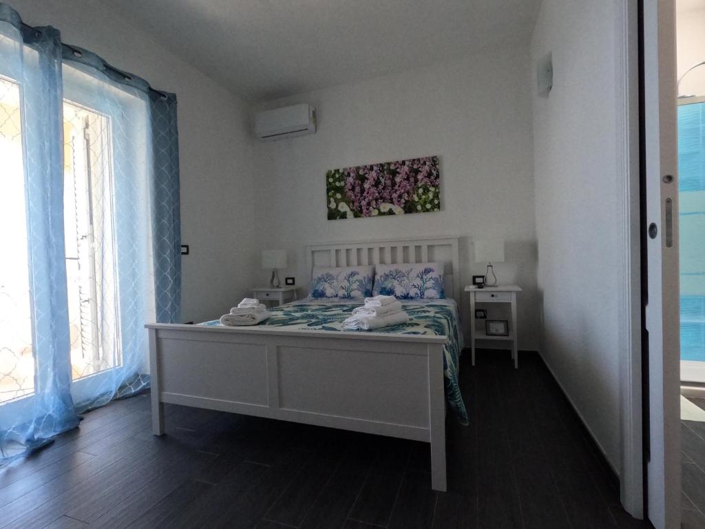 Posteľ alebo postele v izbe v ubytovaní B&B The Sun 'tis