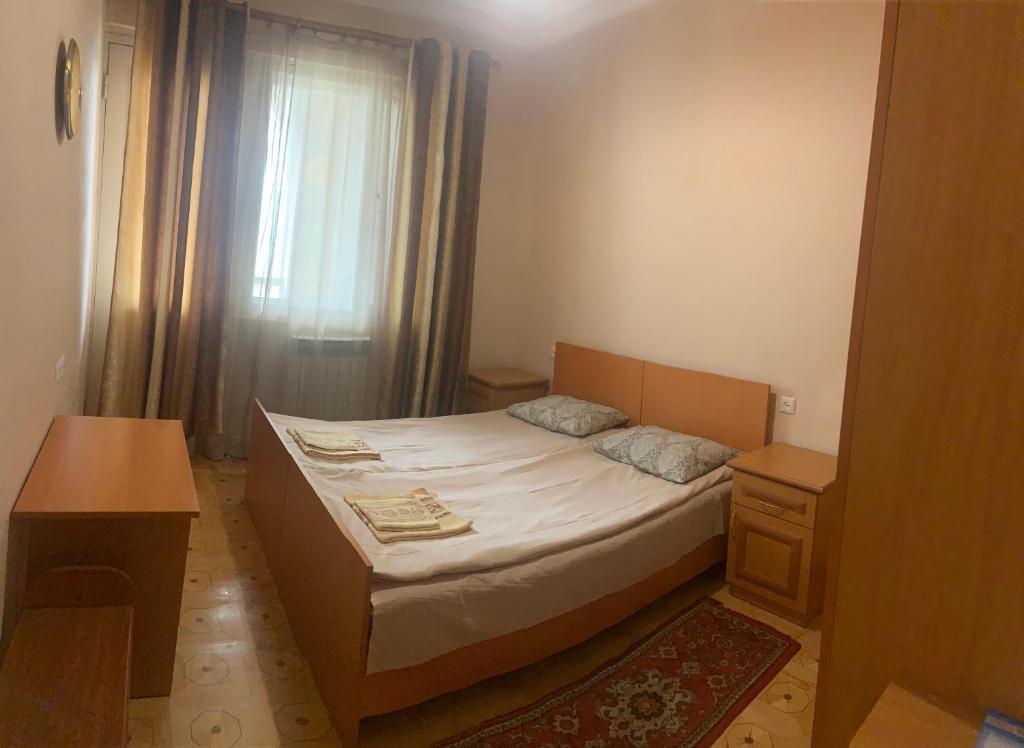 Postel nebo postele na pokoji v ubytování Guest House Lilia