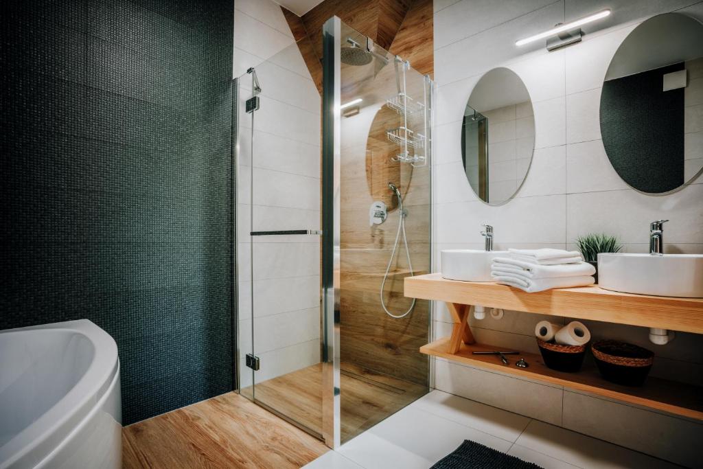 Kúpeľňa v ubytovaní Apartamenty Widok Tatr