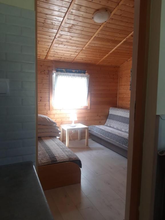 Postel nebo postele na pokoji v ubytování Przy morzu
