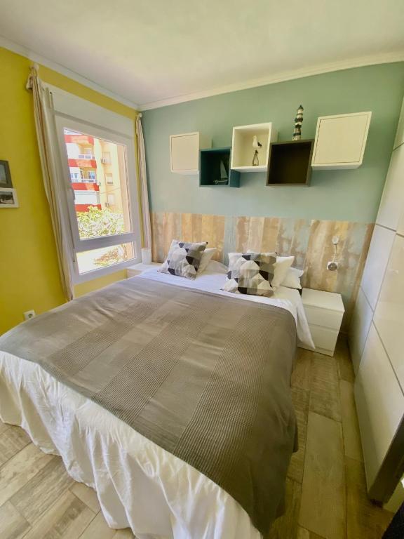 A bed or beds in a room at Estudio Sol del Mar
