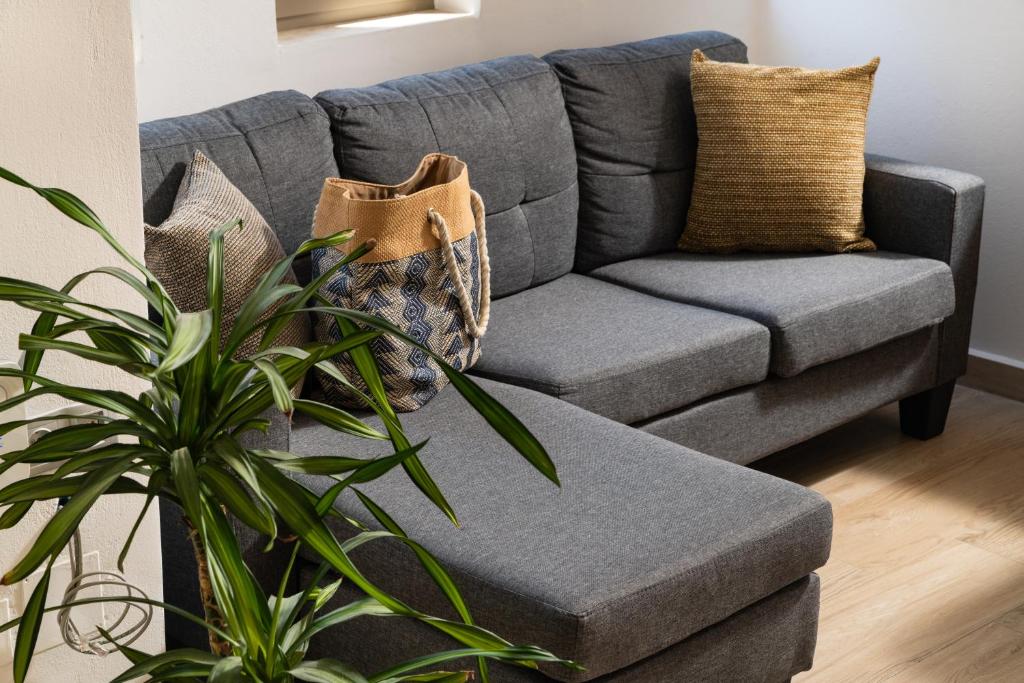 A seating area at ModernPastel Apartment - Private Parking,Near the Old Port