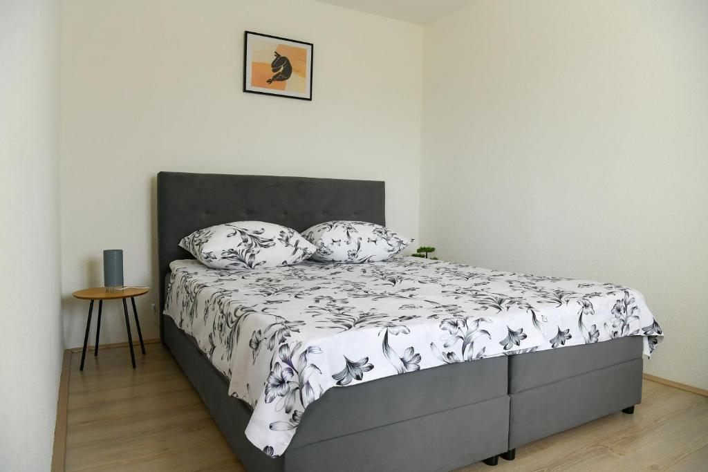 Postel nebo postele na pokoji v ubytování Apartman Noa