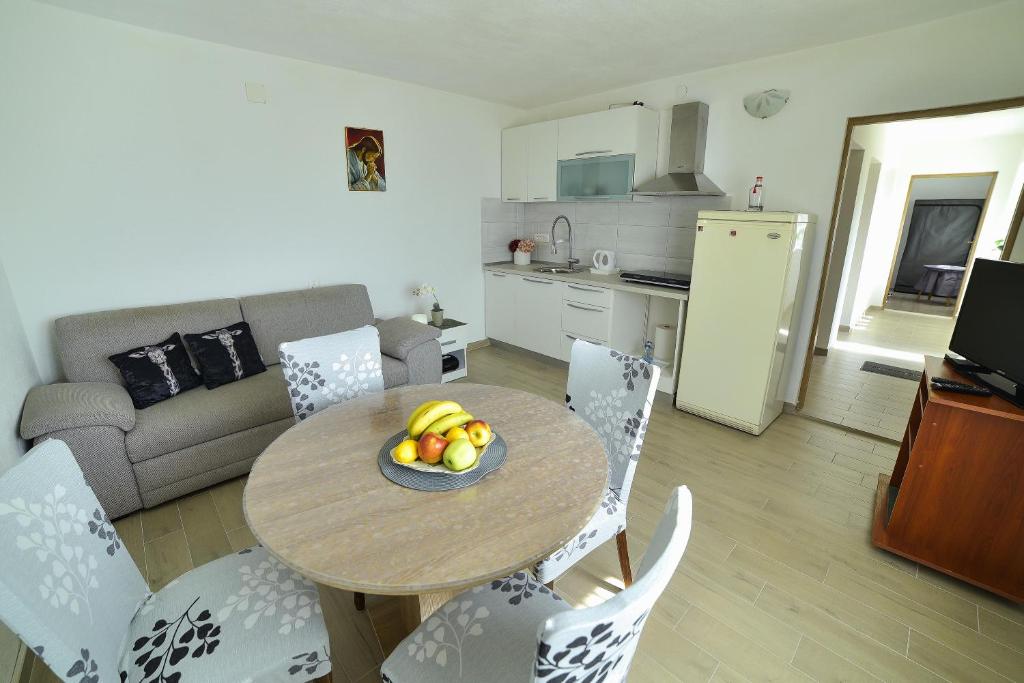 Kuchyň nebo kuchyňský kout v ubytování Apartman Noa