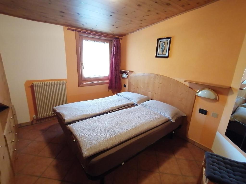 Łóżko lub łóżka w pokoju w obiekcie Wood Apartments
