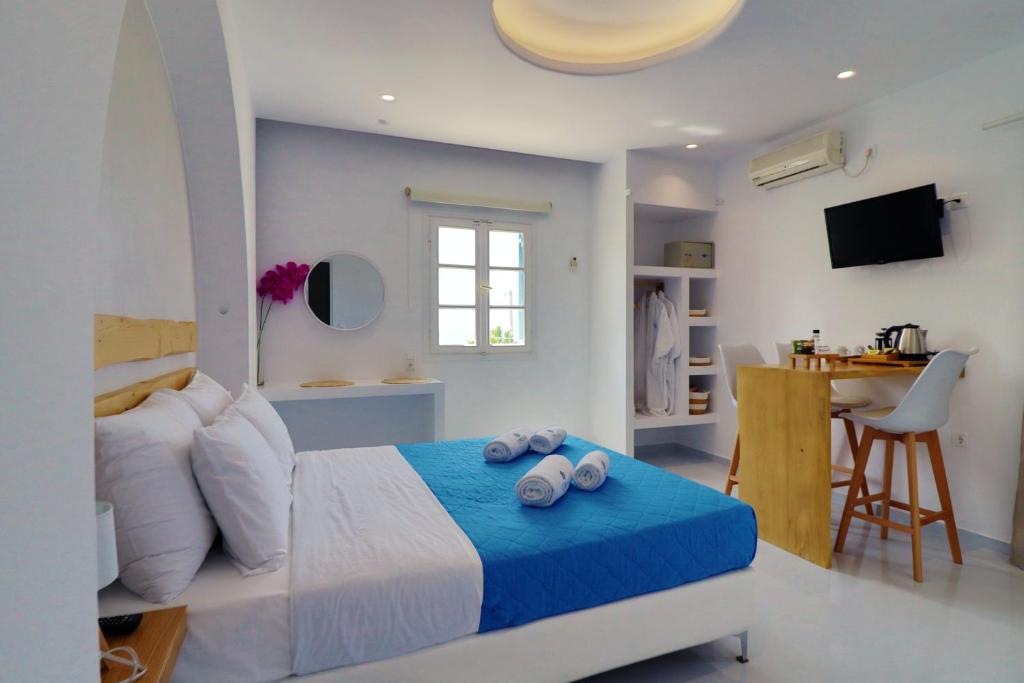 Postel nebo postele na pokoji v ubytování Coralli Beach Apartments