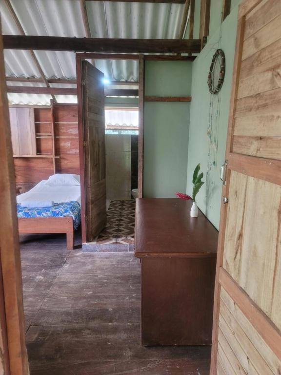 Letto o letti in una camera di Ecohotel Bahía Terco