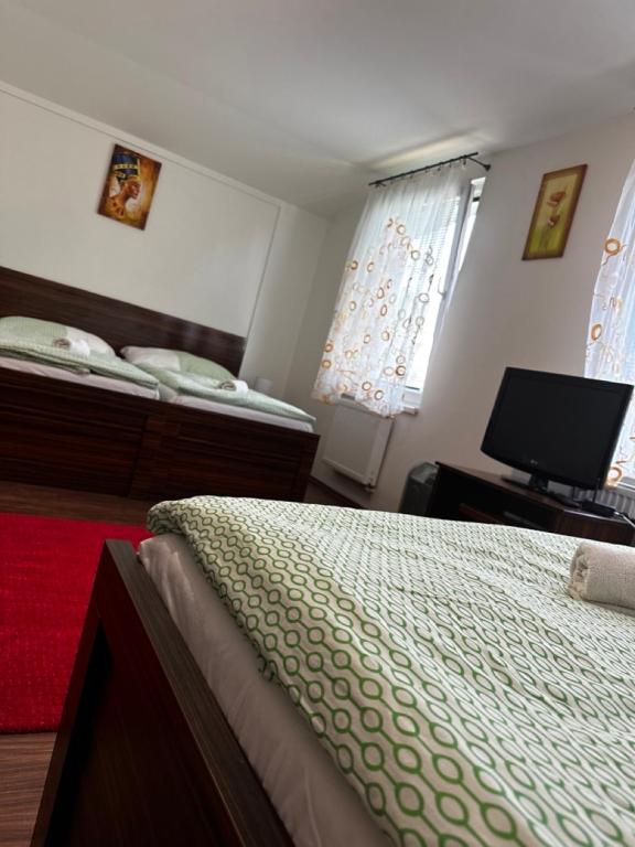 Postel nebo postele na pokoji v ubytování Chata Zemplin