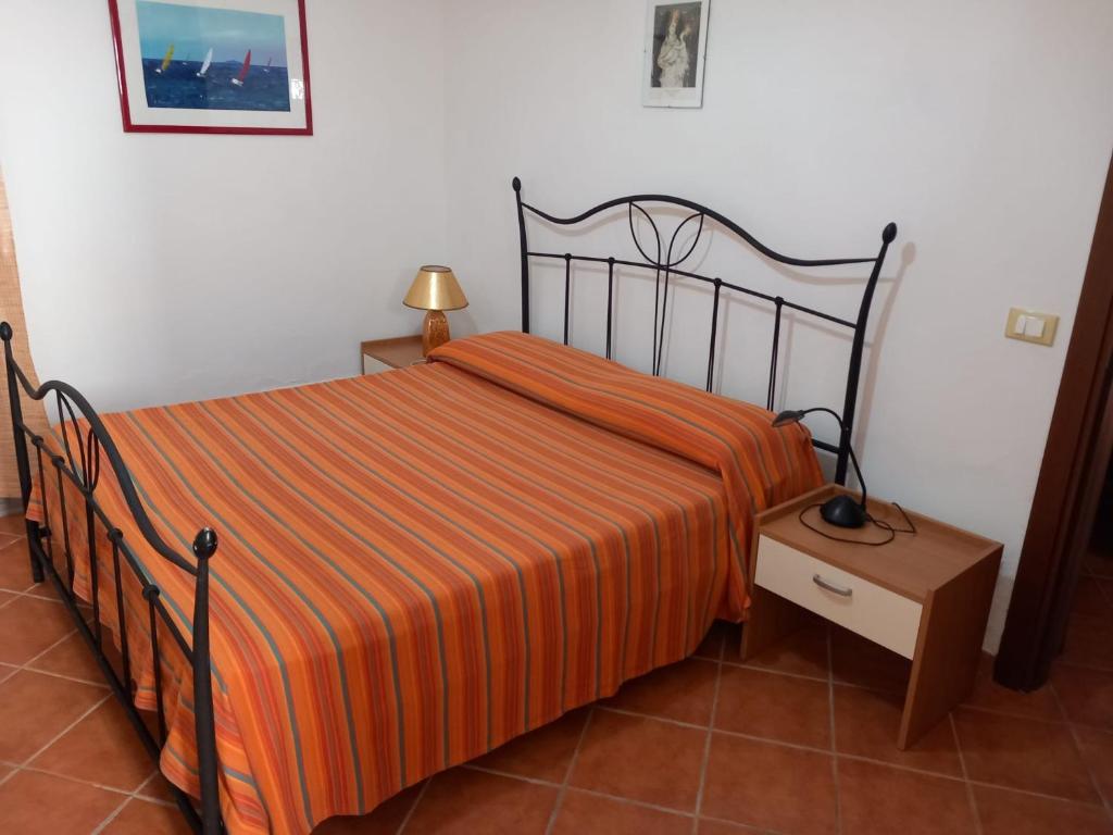 Postel nebo postele na pokoji v ubytování La casa di Andrea