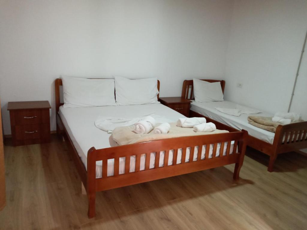 Postel nebo postele na pokoji v ubytování Guesthouse Kroni I Micanit
