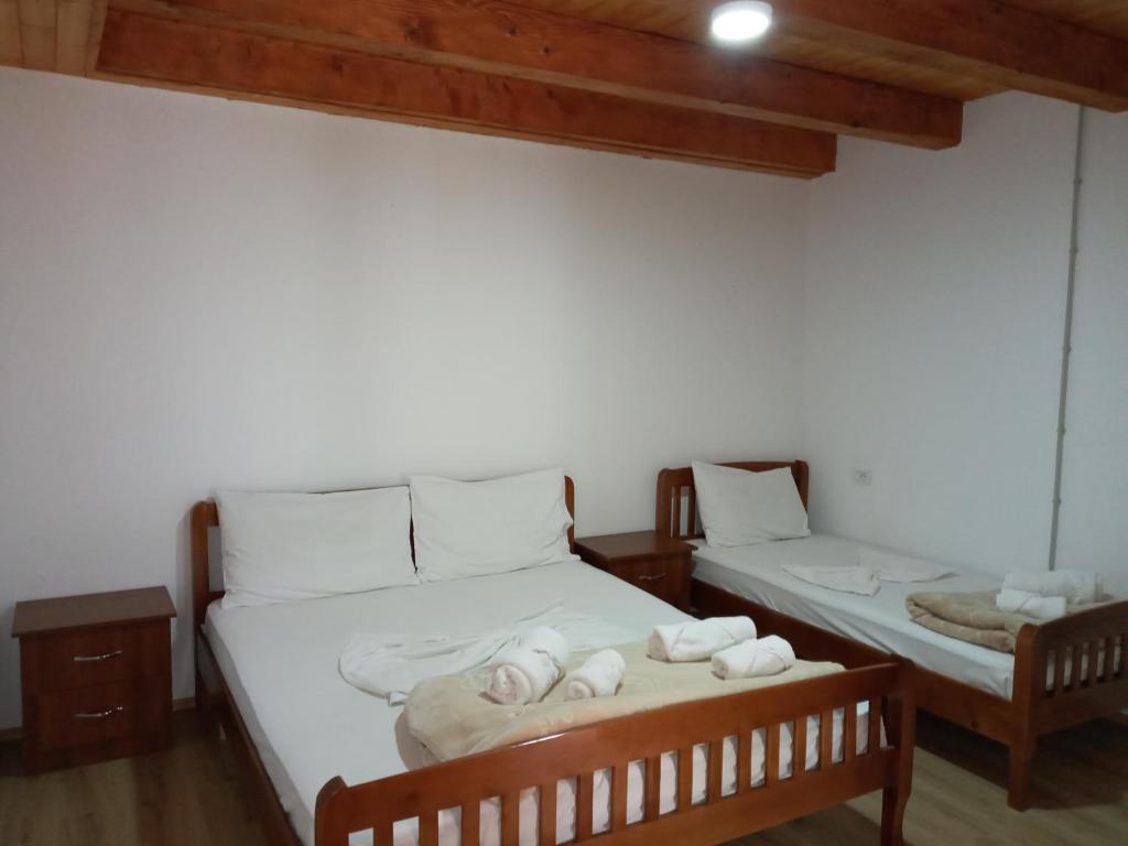 Postel nebo postele na pokoji v ubytování Guesthouse Kroni I Micanit