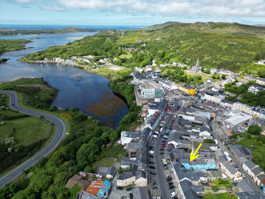 an aerial view of a town next to a river at Property 444 - Clifden in Clifden