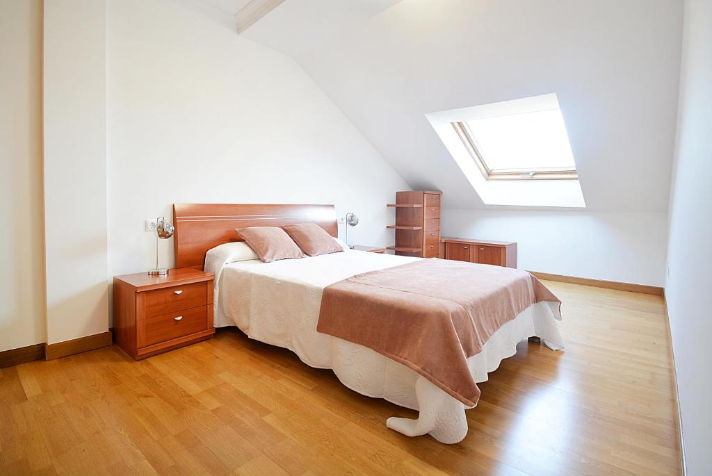 Posteľ alebo postele v izbe v ubytovaní GALIHOST - Céntrico apartamento con parking en Cambados