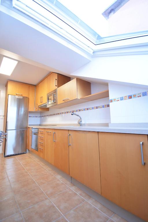 Kuchyňa alebo kuchynka v ubytovaní GALIHOST - Céntrico apartamento con parking en Cambados