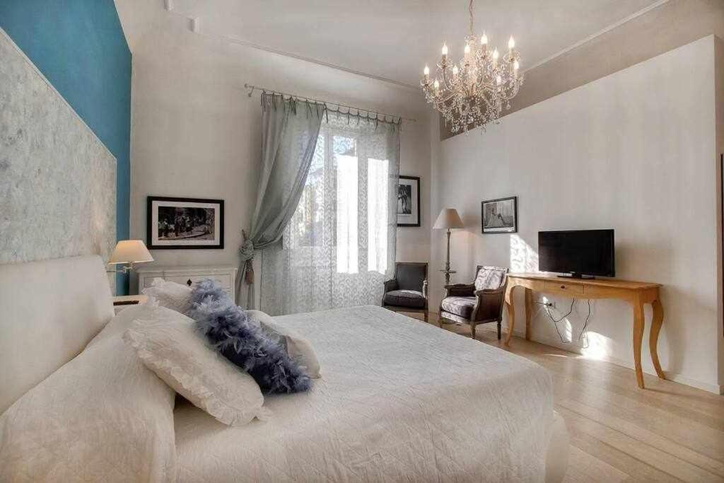 Posteľ alebo postele v izbe v ubytovaní San marco elegant apartment