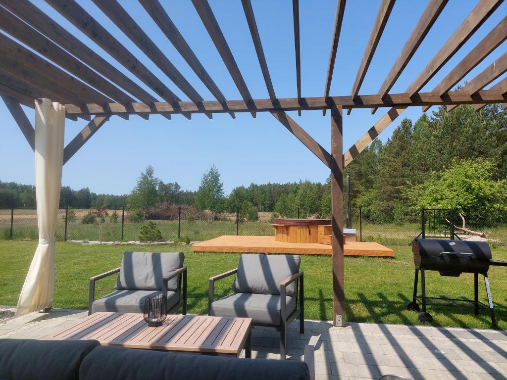 Vonkajšia záhrada v ubytovaní Domek nad Marychą - Zelwa
