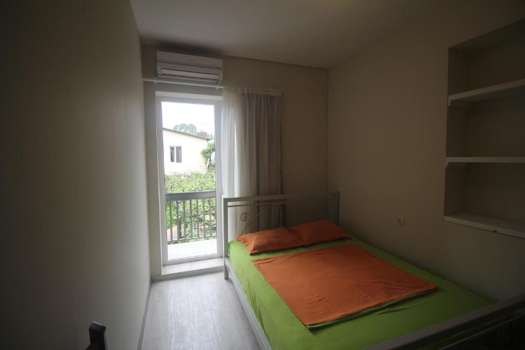 Postel nebo postele na pokoji v ubytování Hotel Nodmax