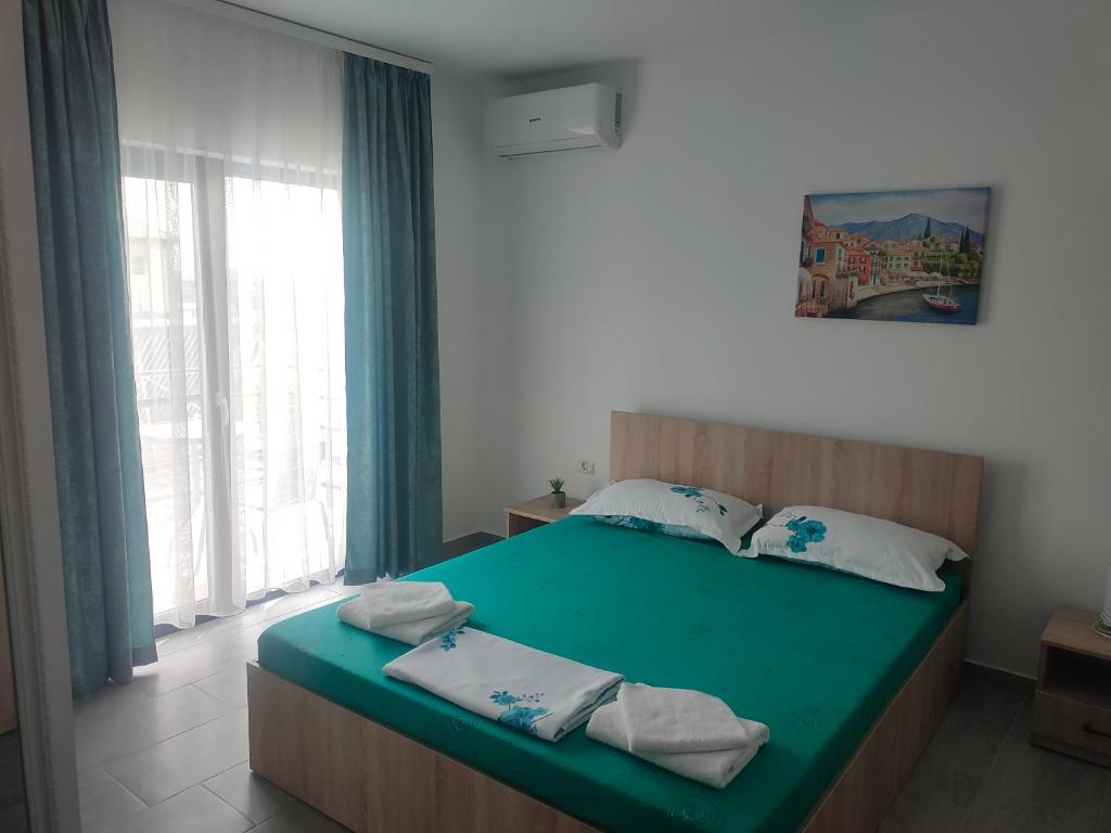 Кровать или кровати в номере Vila La Fernando