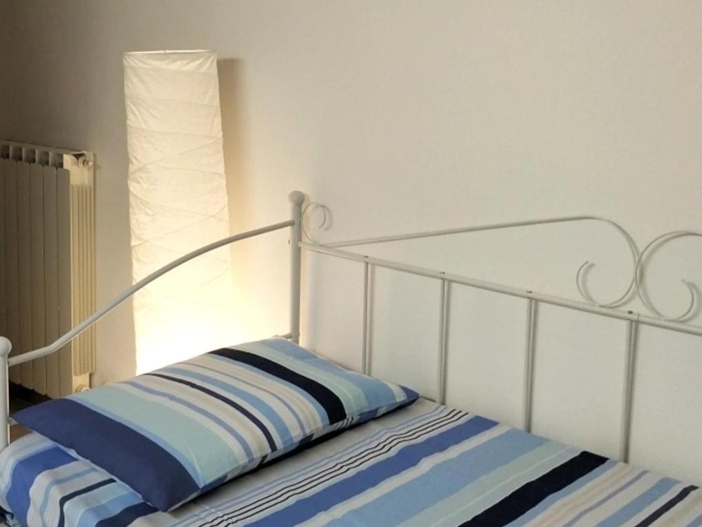 Ein Bett oder Betten in einem Zimmer der Unterkunft Domu Mia