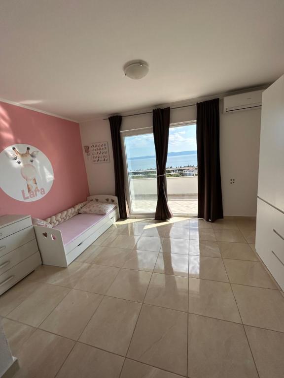 Fotografie z fotogalerie ubytování Apartmani Tomaš v Tučepi