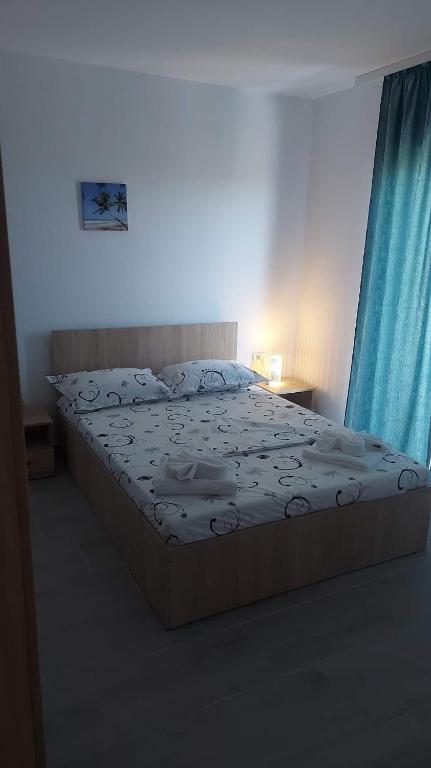Кровать или кровати в номере Vila La Fernando