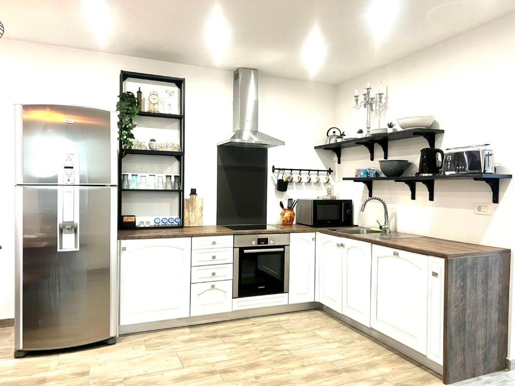 Kuchyň nebo kuchyňský kout v ubytování Apartma Lucija - Dekani
