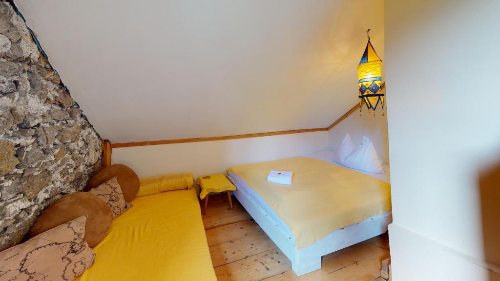 Postel nebo postele na pokoji v ubytování Yoga Resort AlpenRetreat