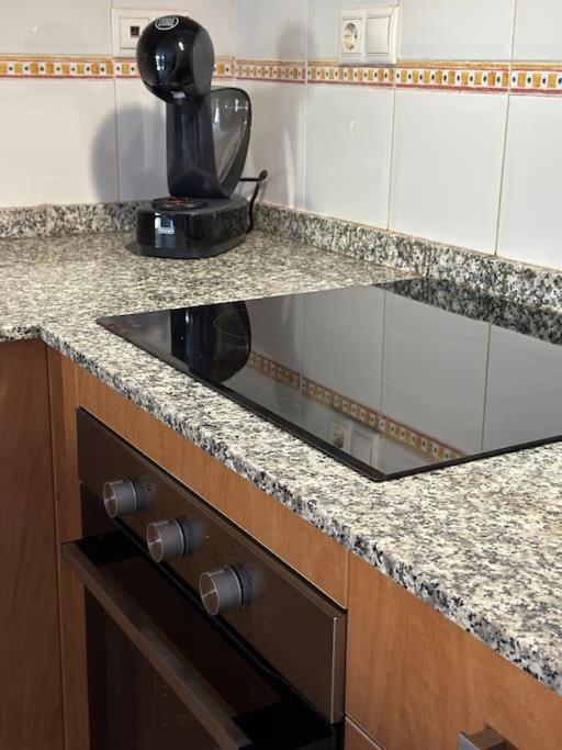 Kuchyň nebo kuchyňský kout v ubytování NUEVO Apartamento en Jávea