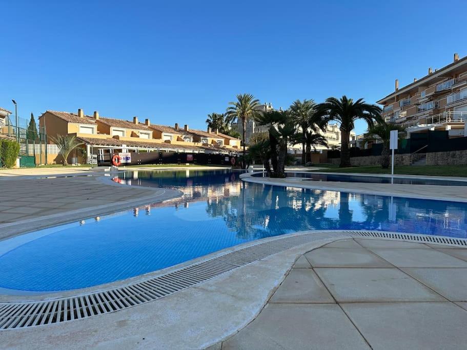 Bazén v ubytování NUEVO Apartamento en Jávea nebo v jeho okolí