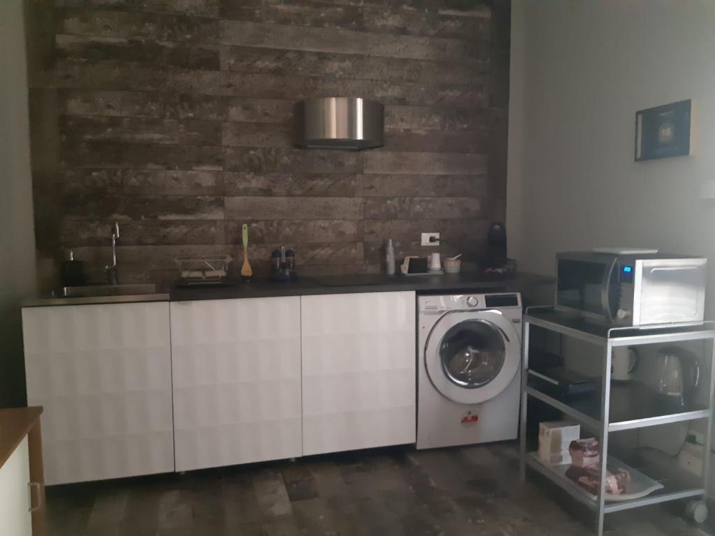 Kuchnia lub aneks kuchenny w obiekcie Appartamento in villa