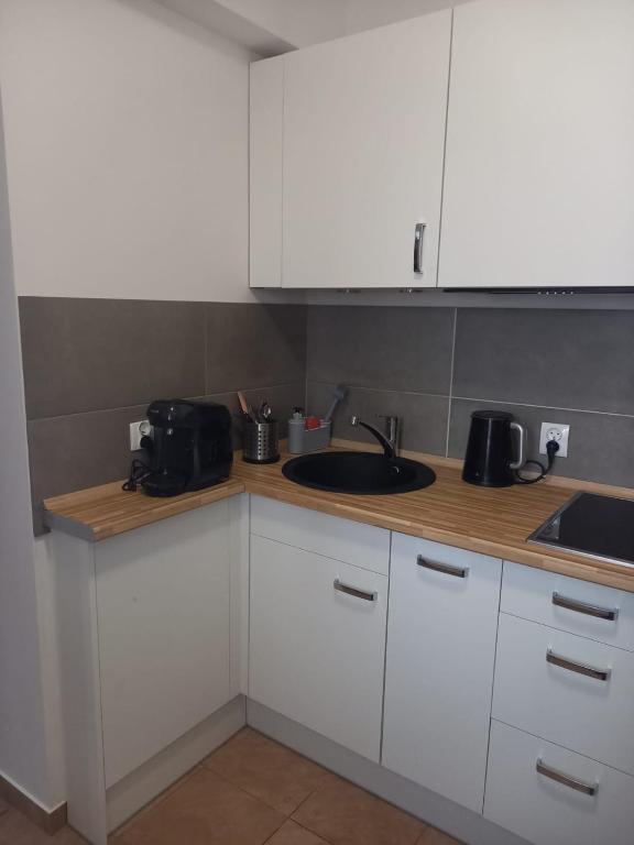 Kuchnia lub aneks kuchenny w obiekcie Planeta Apartment Mielno