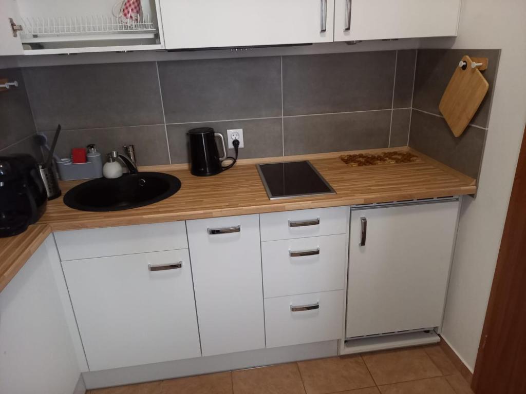 Kuchnia lub aneks kuchenny w obiekcie Planeta Apartment Mielno