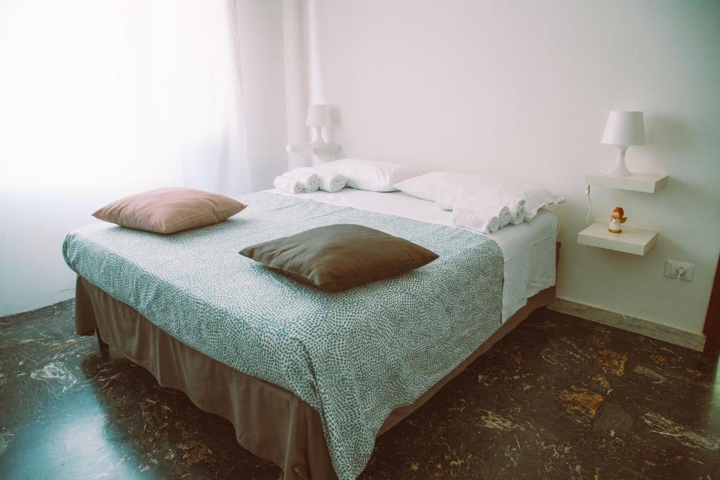 Posteľ alebo postele v izbe v ubytovaní Nupa Apartment
