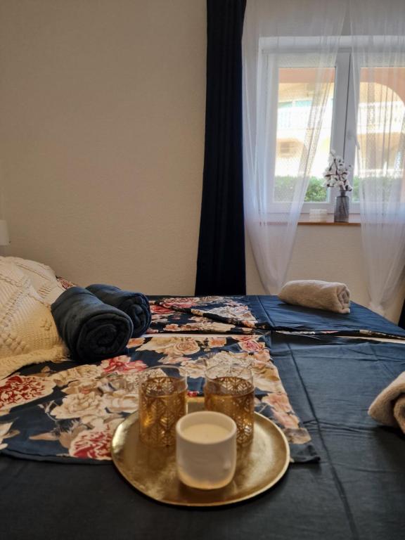 Łóżko lub łóżka w pokoju w obiekcie Apartment Melani
