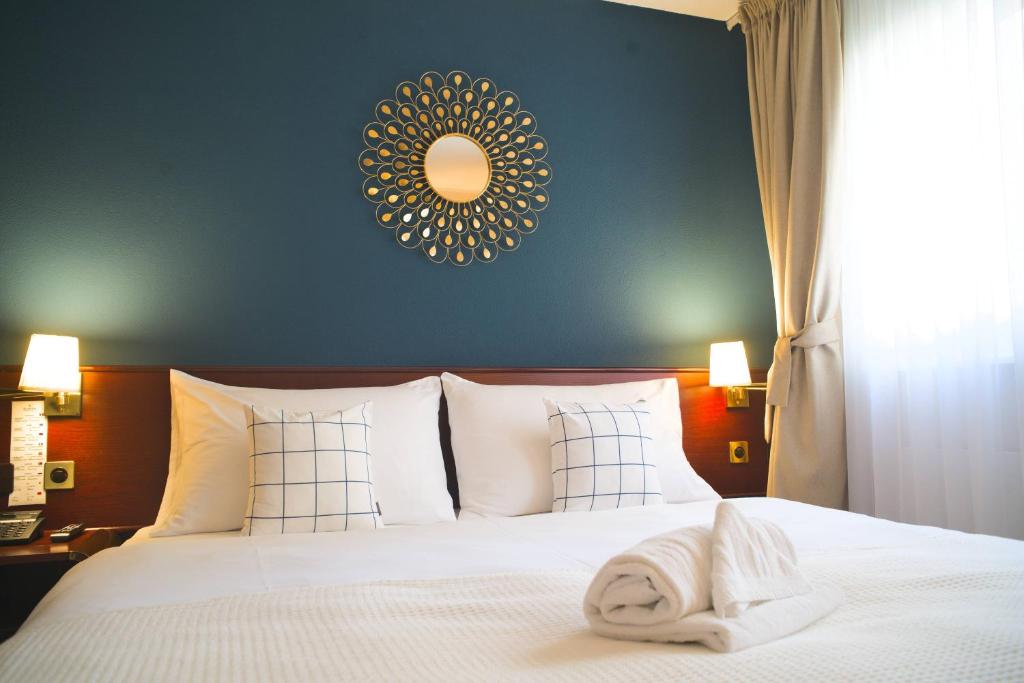 Кровать или кровати в номере Tulip Inn Beaulieu Lausanne