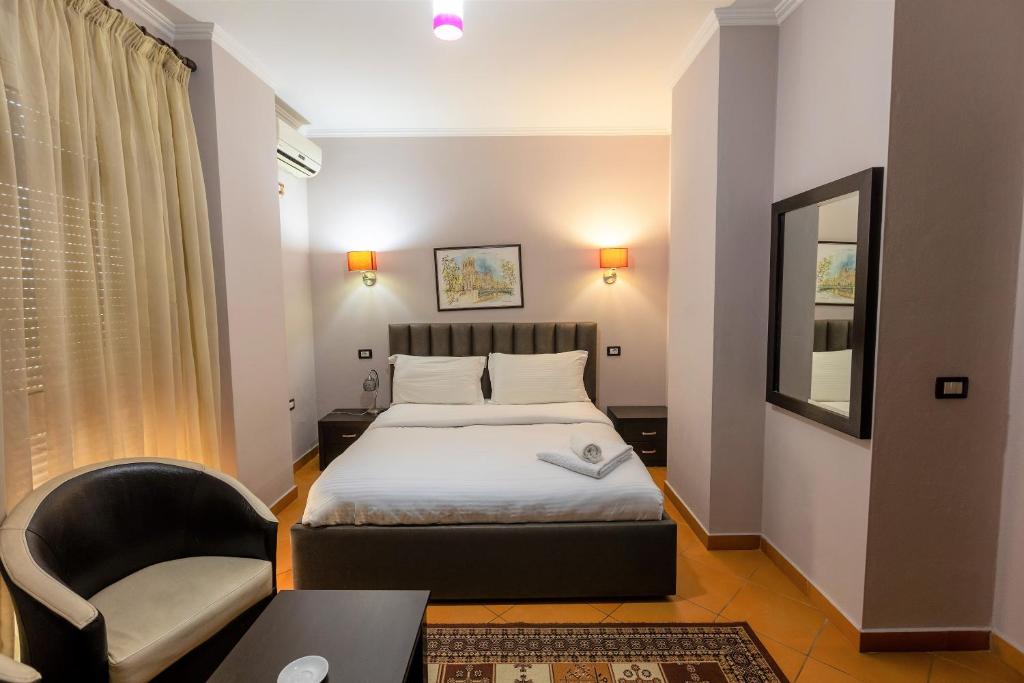 Postel nebo postele na pokoji v ubytování Prince Hotel
