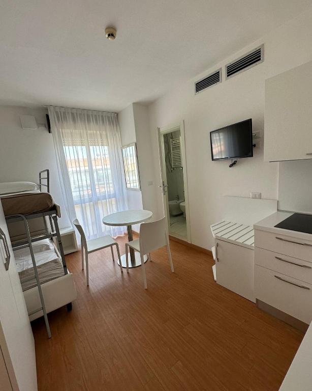 Kuchyň nebo kuchyňský kout v ubytování Hotel Ardea