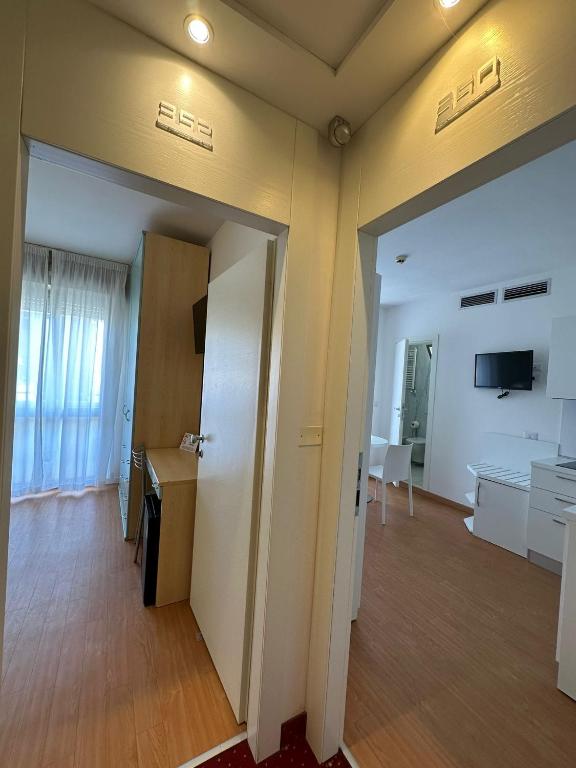 TV a/nebo společenská místnost v ubytování Hotel Ardea