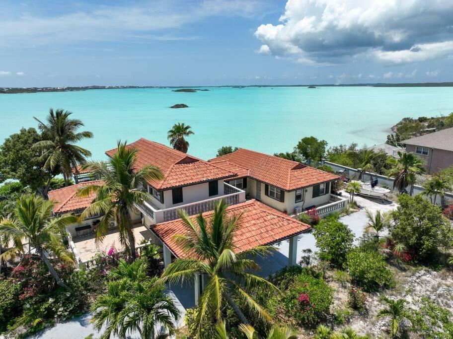 an aerial view of a house with the ocean in the background at Turquoise Haven Villa in Providenciales