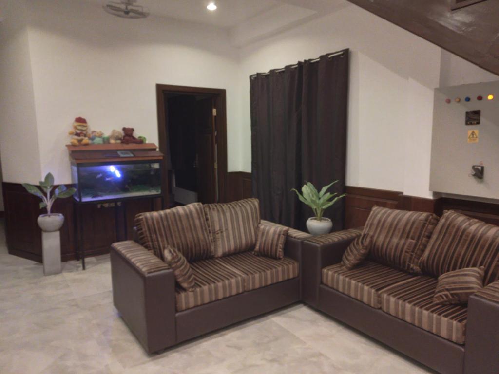 Posezení v ubytování Alffa Guest Inn