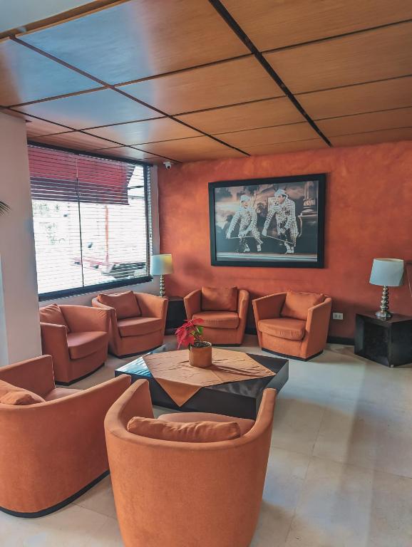 Posezení v ubytování Hotel Charlotte Suite 26