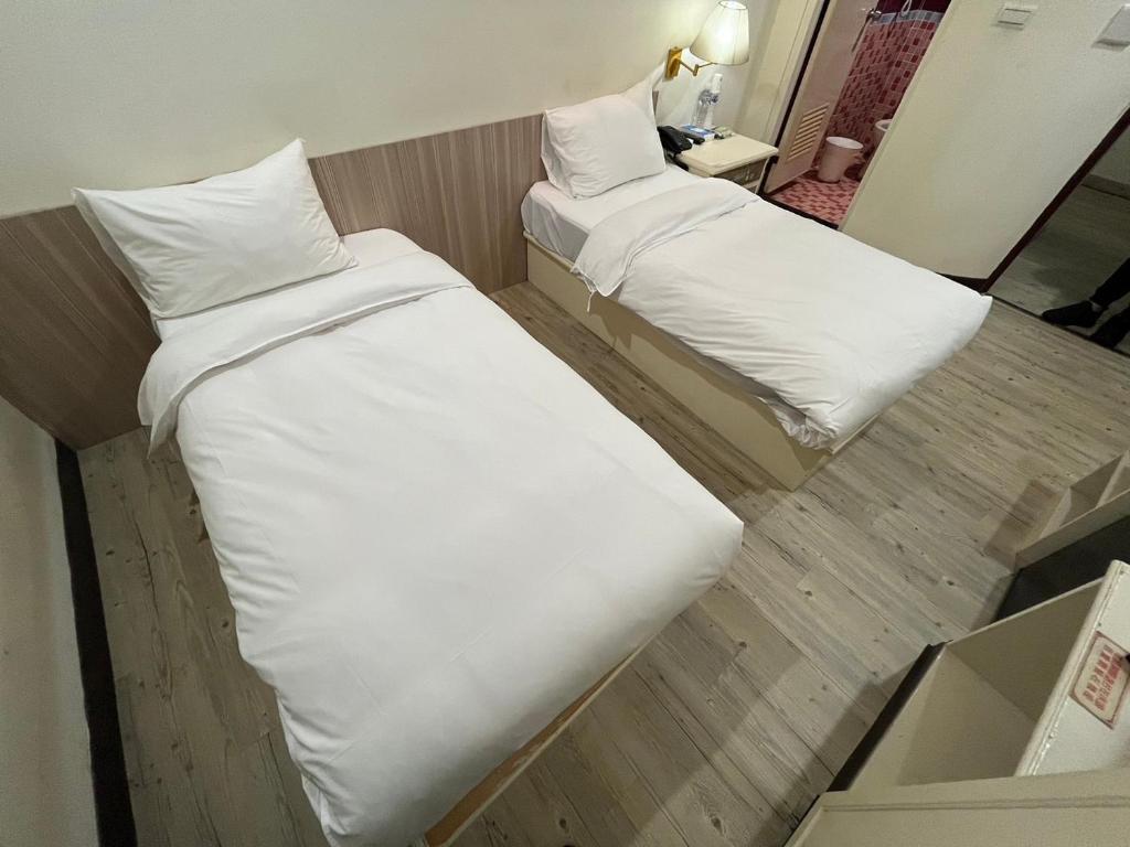 Letto o letti in una camera di 日日 Meworld
