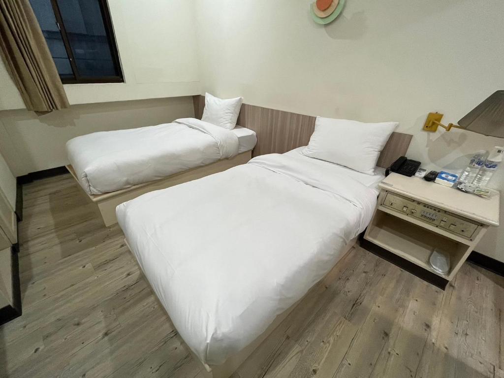 Letto o letti in una camera di 日日 Meworld