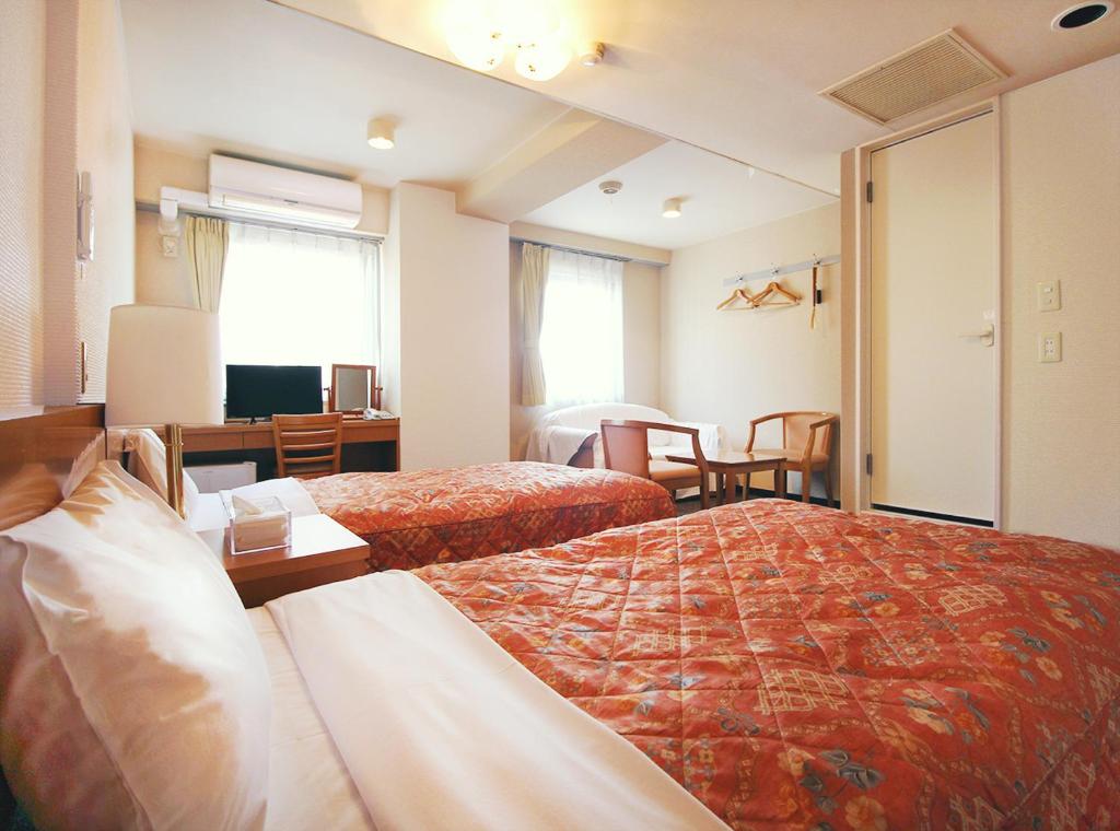ビジネスホテルマーキュリー（ロイヤルイングループ） - Twin Room Met Bankbed - Niet -roken