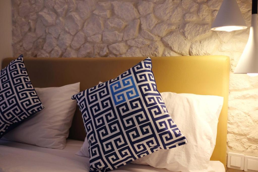 Postel nebo postele na pokoji v ubytování Little Mykonos