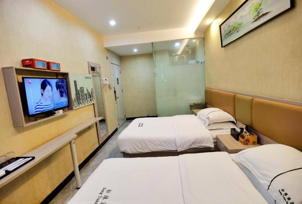TV a/nebo společenská místnost v ubytování Songyuan Hotel 松缘酒店