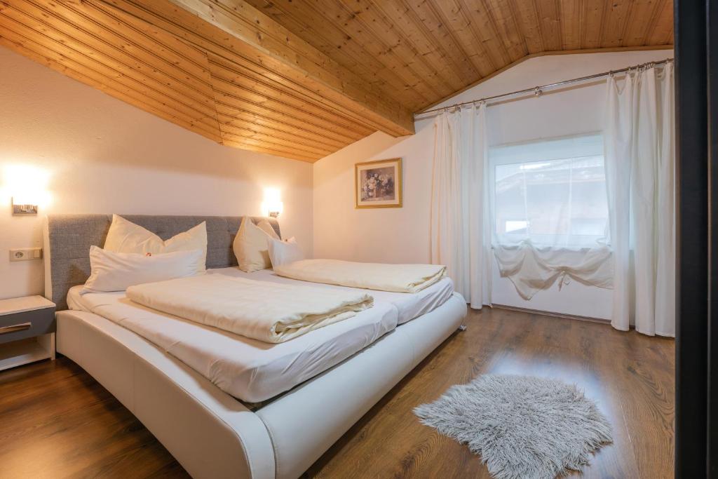 Postel nebo postele na pokoji v ubytování Pension Steinadler